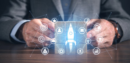 Man showing rocket with a business icons and network. business. startupの写真素材
