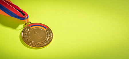 Medal awards for winner on the green background.