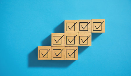 Checkbox on wooden cubes. business conceptの写真素材