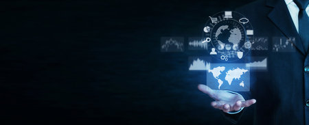 Man showing a world map, graphs. digital technology. Finance