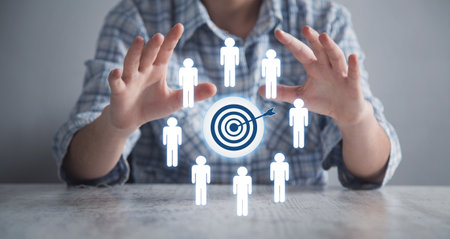 Human showing target dart with a people symbols. targeting conceptの写真素材