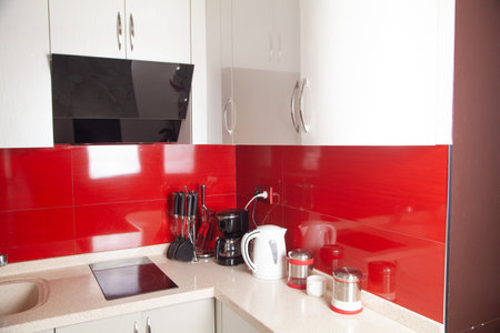 Set of cookware, white kettle in kitchen.の写真素材