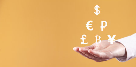 Man showing currency symbols. Business. Financeの写真素材