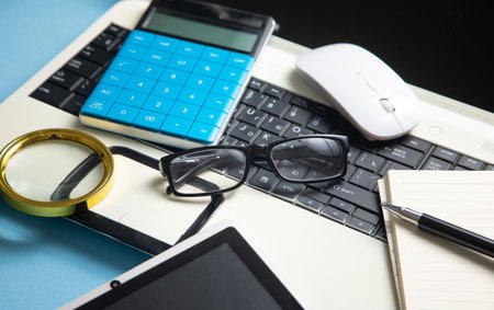 Eyeglasses, laptop computer and other business objects.の写真素材