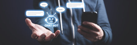 Human holding smartphone with Chat Bot application for online information. Artificial Intelligence...