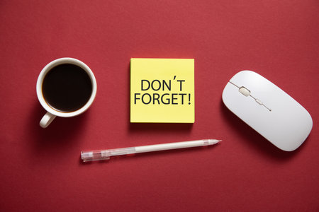 Don't forget reminder on sticky note.の写真素材