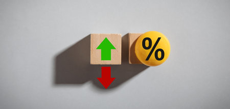 Percentage symbol with up and down arrows. Interest rates