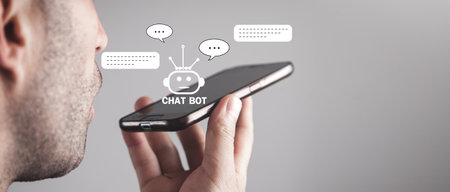 Human holding smartphone with Chat Bot application for online information. Artificial Intelligence conceptの写真素材