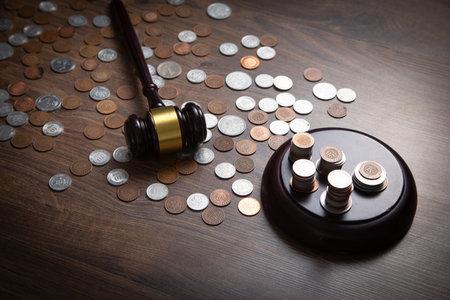 Stack of coins with judge gavel.の写真素材