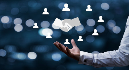 Handshake of business partners with a human symbols. Successful dealの写真素材