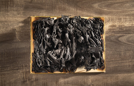 Burning book on the wooden table.の写真素材