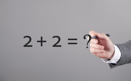 Human writes 2+2=? in screen.