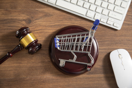 Judge gavel with a shopping cart.の写真素材