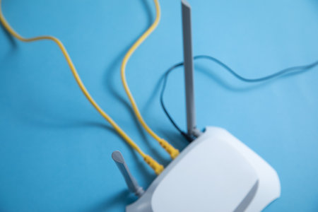 Wi fi router on the blue background.の写真素材
