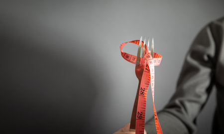 Measuring tape with fork. Dietの写真素材