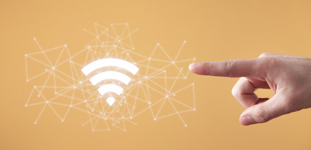 Male hand showing Wireless technology symbol. WiFi symbol with a network connectionの写真素材