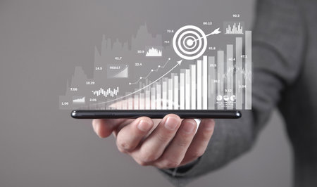 Man showing achieve business goals with growth graphs. Goals. Business
