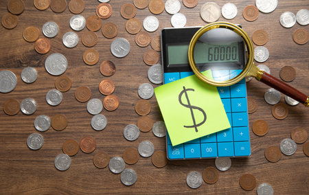 Dollar symbol on the sticky note with a coins. Business. Financeの写真素材