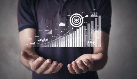 Man showing achieve business goals with growth graphs. Goals. Business