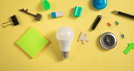 Light bulb with a business supplies. Business. Creative ideaの写真素材