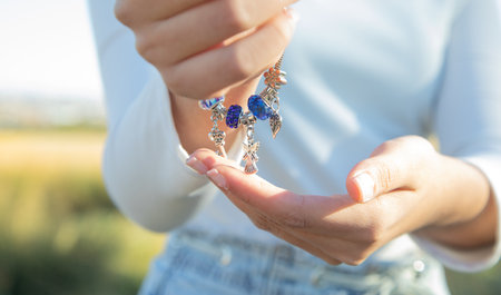 Young woman showing bracelet. Beauty. fashion