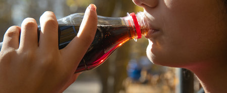 Young woman with bottle of juice.