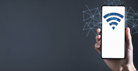 Male hand showing Wireless technology symbol. WiFi symbol with a network connectionの写真素材