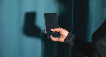 Caucasian woman using mobile phone.