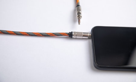 Audio cable connected in smartphone. Technologyの写真素材