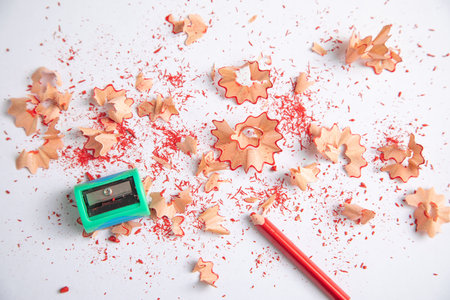 A pencil sharpener with a pencil and pencil shavings.の写真素材