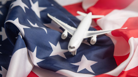 Toy airplane with US flag. Travelの写真素材