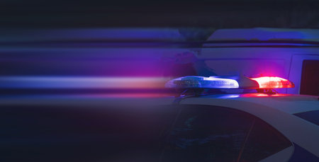 Police car in the city at night.の写真素材