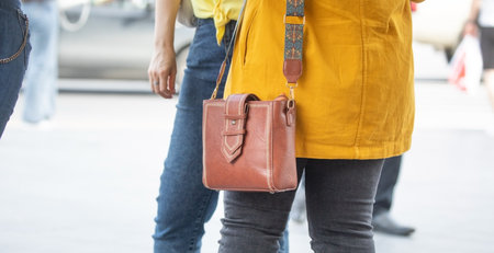 Woman in a bag in the city street.の写真素材