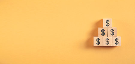 Dollar symbols on wooden cube. Business. Finance