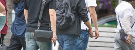 Tourists in a backpack in the city.の写真素材