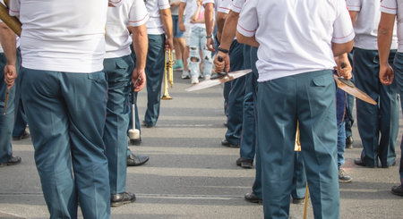 Police force officers with a musical instruments in the city.の写真素材