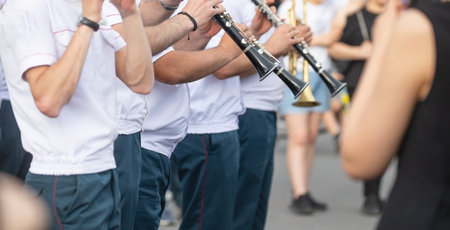 Police force officers with a musical instruments in the city.の写真素材
