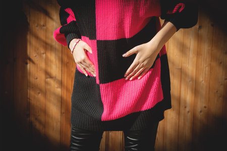 Caucasian woman suffering from stomach pain.の写真素材