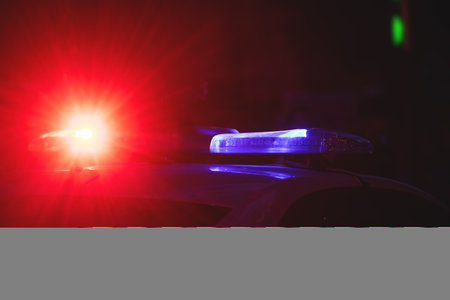 Police car in the city at night.の写真素材
