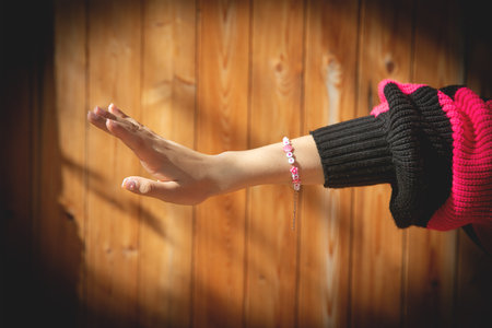 Young caucasian woman showing empty hand.の写真素材
