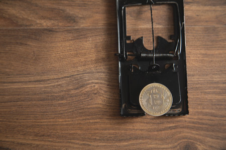 Bitcoin in mouse trap. Virtual currencyの写真素材