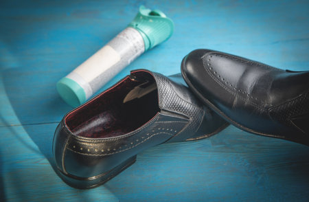Black shoe with an antibacterial spray.の写真素材
