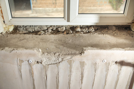Old window sill before renovation at home.の写真素材