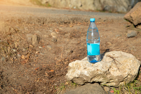 Bottle of clean water in nature.の写真素材