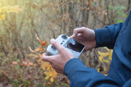 Caucasian man using drone controller.の写真素材