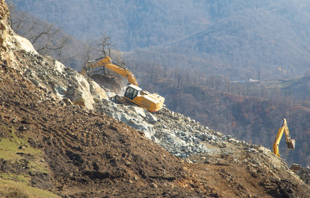 Excavator working at construction site.の写真素材