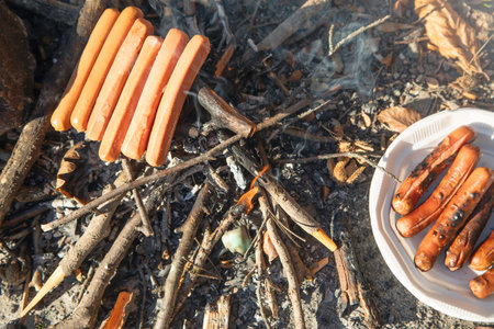 Preparing sausage barbecue in outdoor.の写真素材