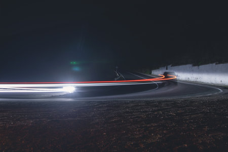 Highway car light trails at night.の写真素材