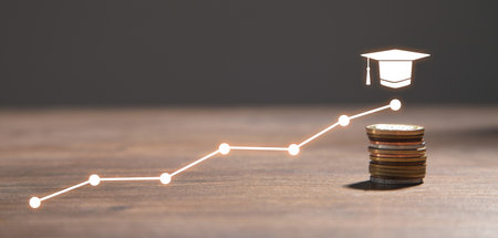 Graduation cap with a coins. Education. Developmentの写真素材