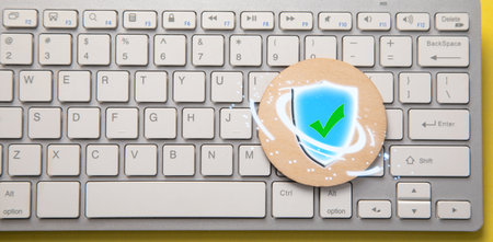 Shield protection and computer keyboard. Internet and technology protection